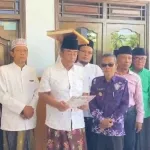 Bambang Budianto saat bersumpah Al-Qur'an demi buktikan kebenaran atas tudingan miring yang menyeret namanya